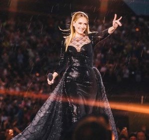 Adele Makes Wardrobe Change Onstage After Downpour During Munich Show